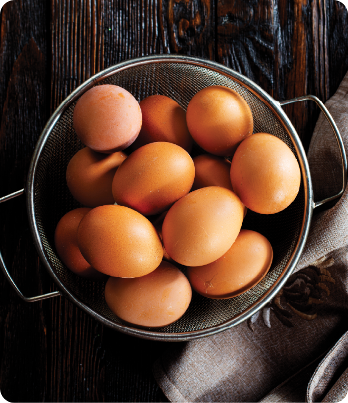 Free range eggs in a metal bowl